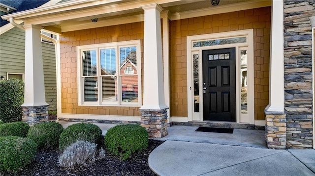 doorway to property with a porch