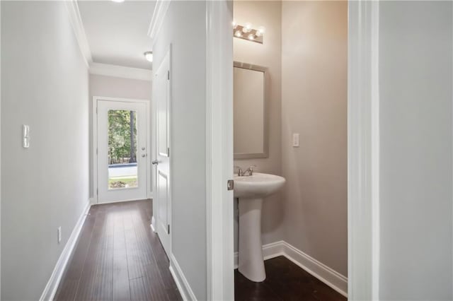 bathroom featuring hardwood / wood-style floors and ornamental molding