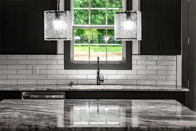 2462 New Hope Rd, Morganton, GA 30560 - kitchen featuring a sink, dark cabinets, and tasteful backsplash