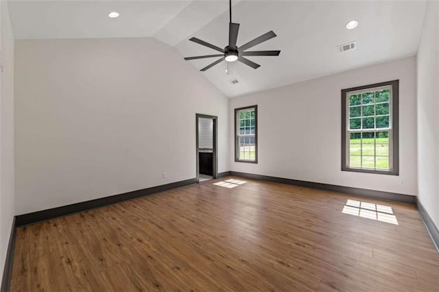 2462 New Hope Rd, Morganton, GA 30560 - unfurnished room featuring plenty of natural light, vaulted ceiling, ceiling fan, wood finished floors, and baseboards