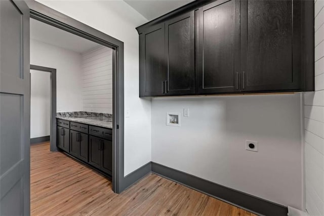 2462 New Hope Rd, Morganton, GA 30560 - laundry room featuring hookup for a washing machine, electric dryer hookup, cabinet space, light wood-style flooring, and baseboards