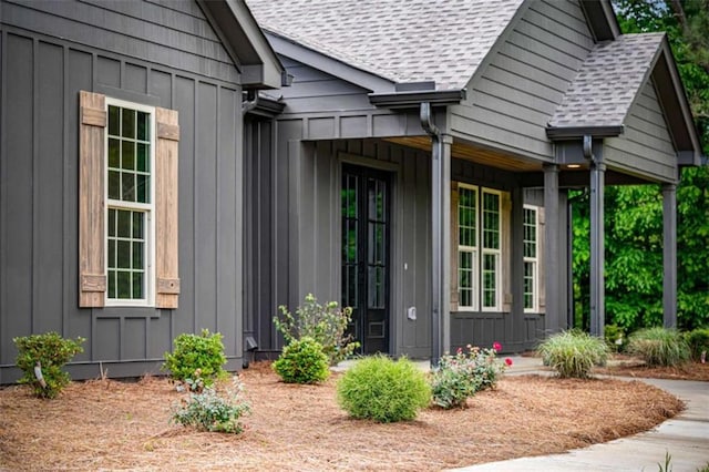 2462 New Hope Rd, Morganton, GA 30560 - doorway to property with board and batten siding, a porch, and roof with shingles