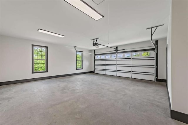 2462 New Hope Rd, Morganton, GA 30560 - garage with a garage door opener and baseboards