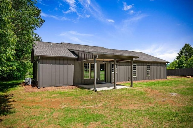 2462 New Hope Rd, Morganton, GA 30560 - back of property featuring board and batten siding, roof with shingles, and a patio