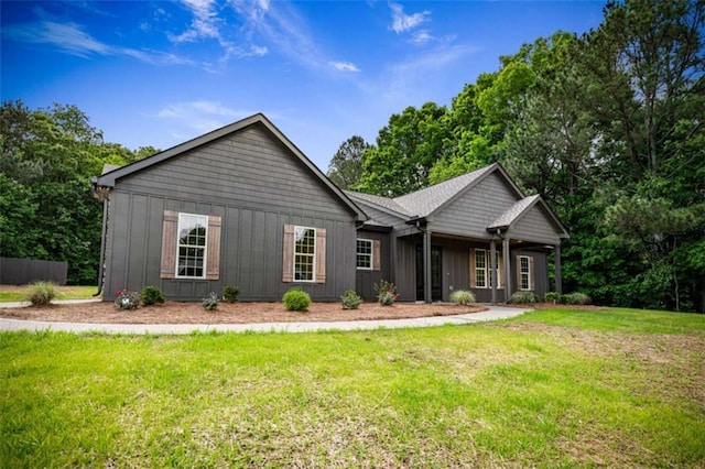 2462 New Hope Rd, Morganton, GA 30560 - view of front of house featuring a front yard and board and batten siding