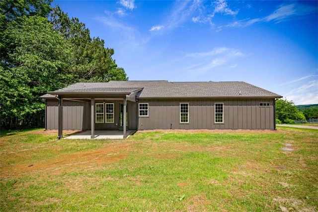 2462 New Hope Rd, Morganton, GA 30560 - rear view of house featuring a patio area, a lawn, and board and batten siding
