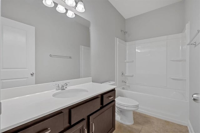 full bathroom with tile patterned flooring, vanity,  shower combination, and toilet