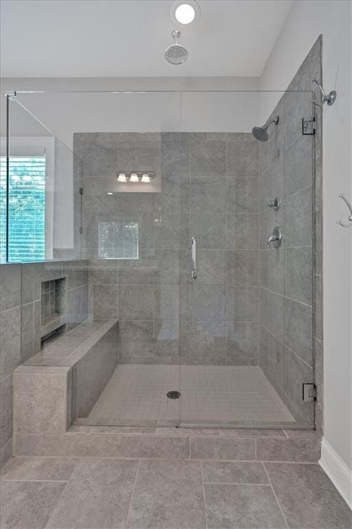 bathroom featuring an enclosed shower