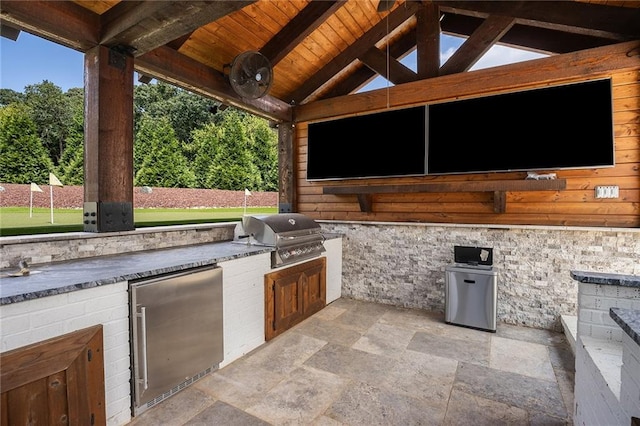 view of patio with a gazebo, grilling area, and an outdoor kitchen