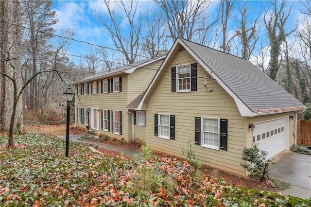 view of front of home with a garage