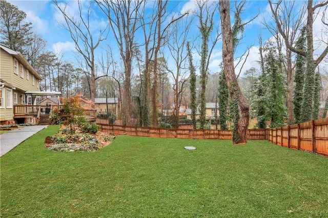 view of yard featuring a deck