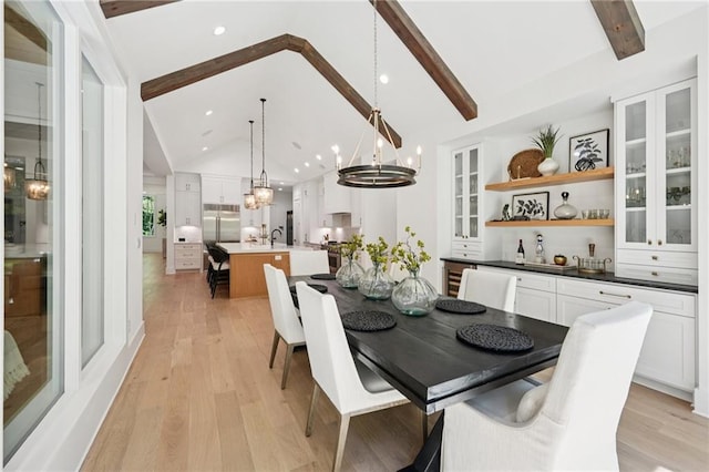 477 Michael Dr, Alpharetta, GA 30009 - dining space featuring a chandelier, beamed ceiling, light wood-style flooring, recessed lighting, and high vaulted ceiling