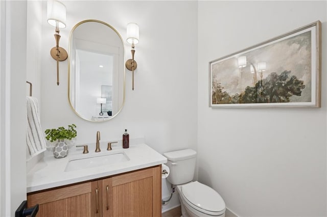 477 Michael Dr, Alpharetta, GA 30009 - half bathroom with vanity and toilet