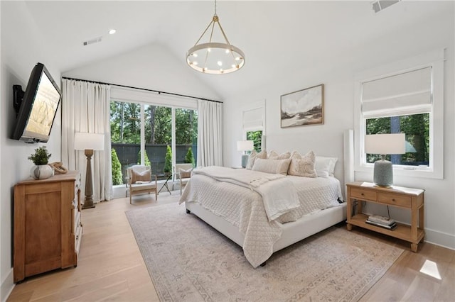 477 Michael Dr, Alpharetta, GA 30009 - bedroom with a chandelier, light wood-type flooring, vaulted ceiling, and recessed lighting