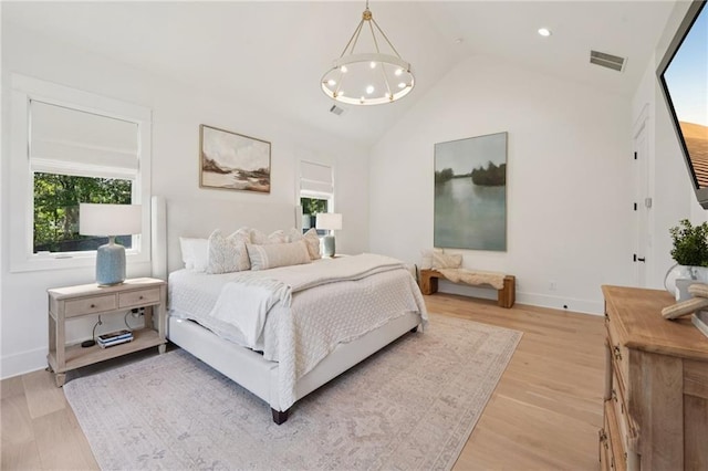 477 Michael Dr, Alpharetta, GA 30009 - bedroom with a chandelier, light wood-type flooring, recessed lighting, and high vaulted ceiling