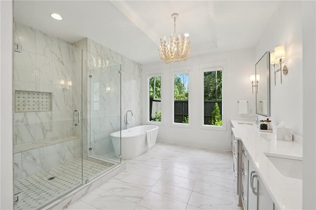 477 Michael Dr, Alpharetta, GA 30009 - full bathroom featuring marble look tile flooring, a freestanding bath, a chandelier, a marble finish shower, and double vanity