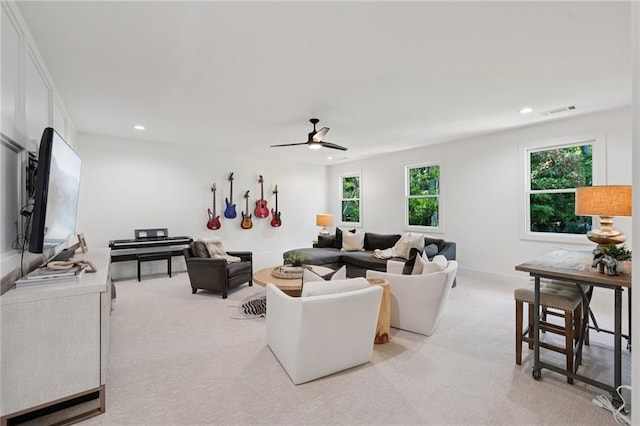 477 Michael Dr, Alpharetta, GA 30009 - living area featuring light carpet, plenty of natural light, recessed lighting, and ceiling fan