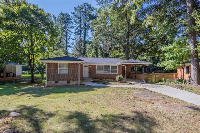 single story home with a front yard