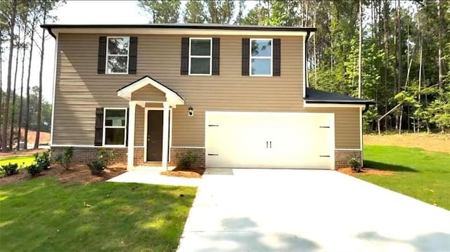 45 Emerald Ln, Covington, GA 30014 - view of front of house with brick siding, concrete driveway, an attached garage, and a front yard