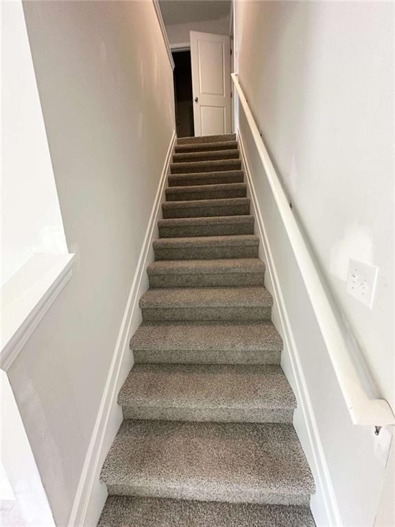 45 Emerald Ln, Covington, GA 30014 - staircase with carpet
