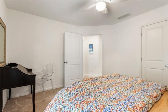 full bathroom featuring vanity, shower / bath combo with shower curtain, toilet, and visible vents