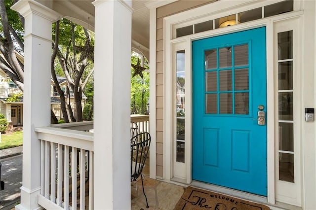 property entrance with a porch