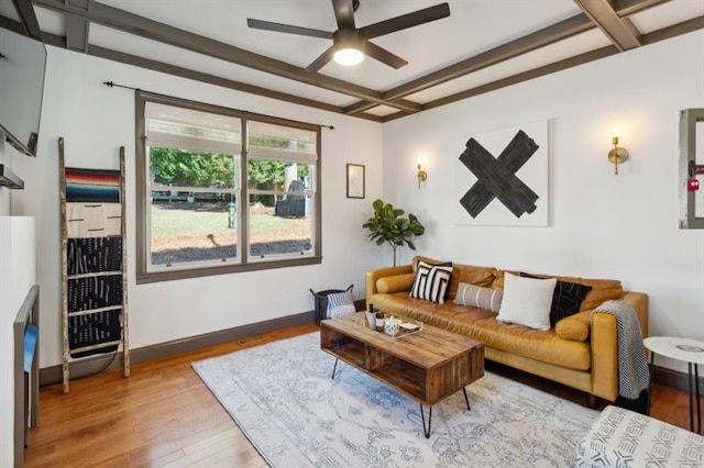 living room with coffered ceiling, hardwood / wood-style floors, ceiling fan, and beamed ceiling