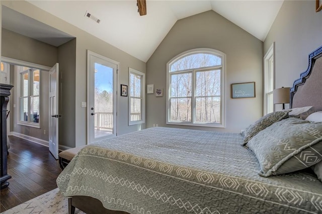 bedroom with visible vents, dark wood-type flooring, baseboards, access to exterior, and vaulted ceiling