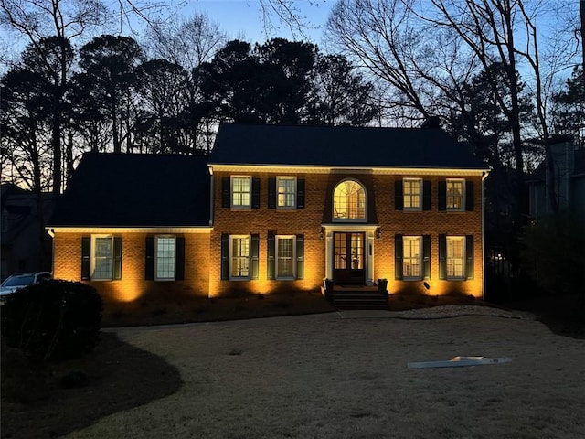 view of front of property featuring brick siding