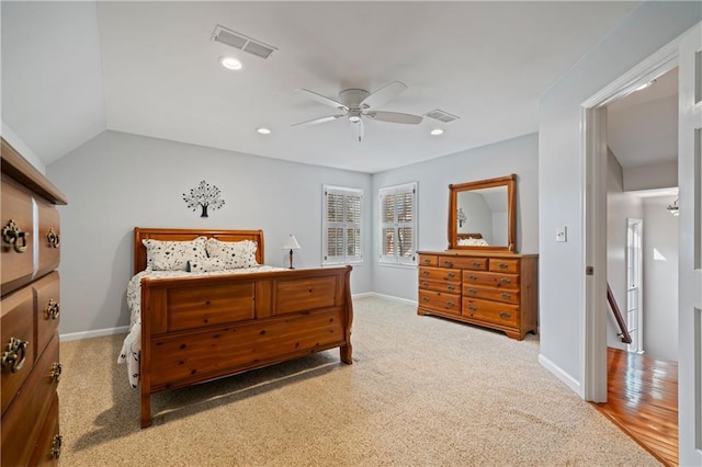 carpeted bedroom featuring recessed lighting, visible vents, baseboards, and a ceiling fan