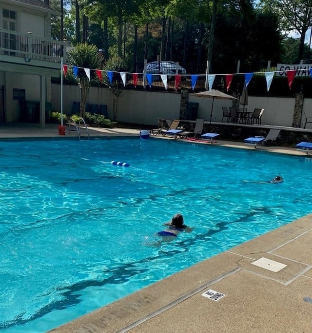 community pool with fence