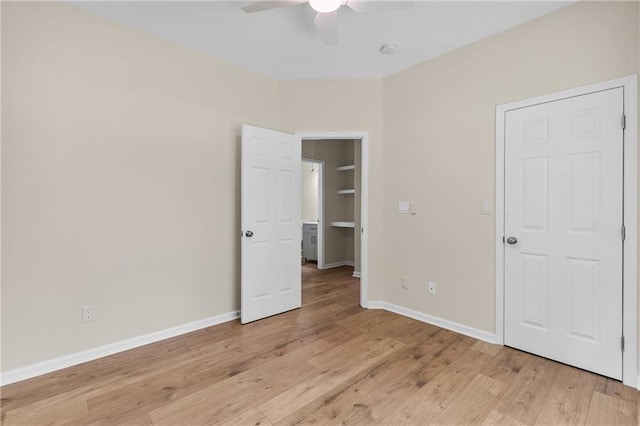 5232 W Mountain St, Stone Mountain, GA 30083 - unfurnished bedroom featuring light wood-type flooring and a ceiling fan