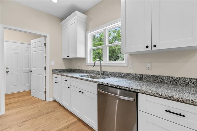 5232 W Mountain St, Stone Mountain, GA 30083 - kitchen featuring dishwasher, light wood finished floors, white cabinetry, dark stone counters, and recessed lighting