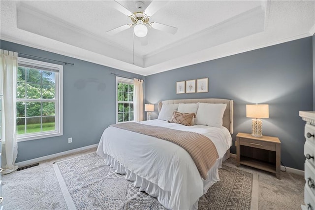 173 Cline Smith Rd NE, Cartersville, GA 30121 - bedroom featuring a raised ceiling, ornamental molding, carpet floors, a ceiling fan, and a textured ceiling