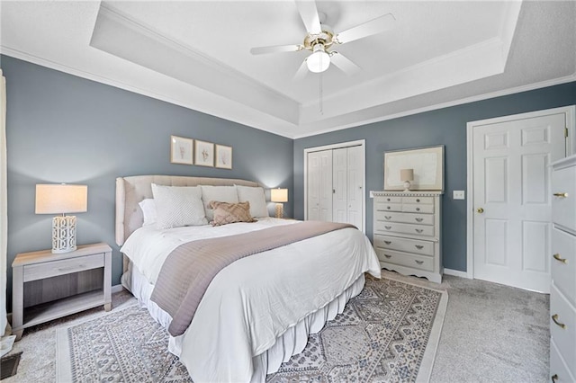 173 Cline Smith Rd NE, Cartersville, GA 30121 - bedroom with a tray ceiling, crown molding, carpet floors, a closet, and ceiling fan