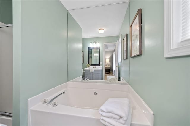 173 Cline Smith Rd NE, Cartersville, GA 30121 - full bathroom with a garden tub, vanity, and a shower with shower door