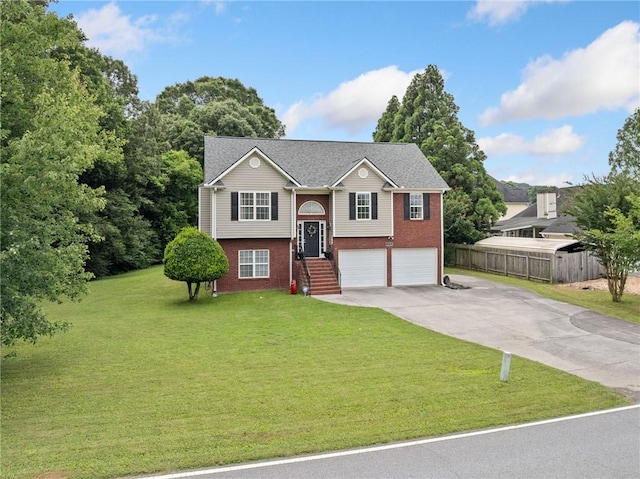 173 Cline Smith Rd NE, Cartersville, GA 30121 - split foyer home with concrete driveway, brick siding, and an attached garage