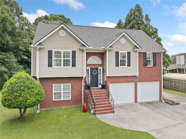 173 Cline Smith Rd NE, Cartersville, GA 30121 - split foyer home with concrete driveway, brick siding, an attached garage, and roof with shingles