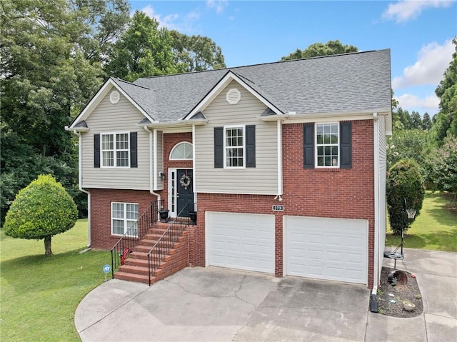 173 Cline Smith Rd NE, Cartersville, GA 30121 - raised ranch with an attached garage, driveway, a front yard, brick siding, and roof with shingles