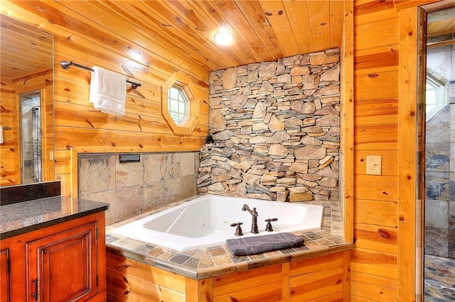 full bath with wood ceiling and a jetted tub