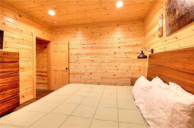 bedroom with wood walls, recessed lighting, and wooden ceiling