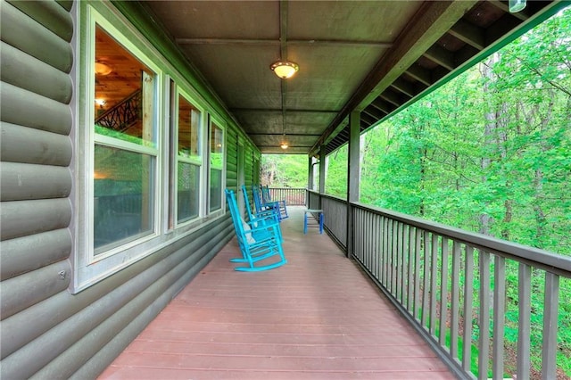 wooden deck featuring a porch