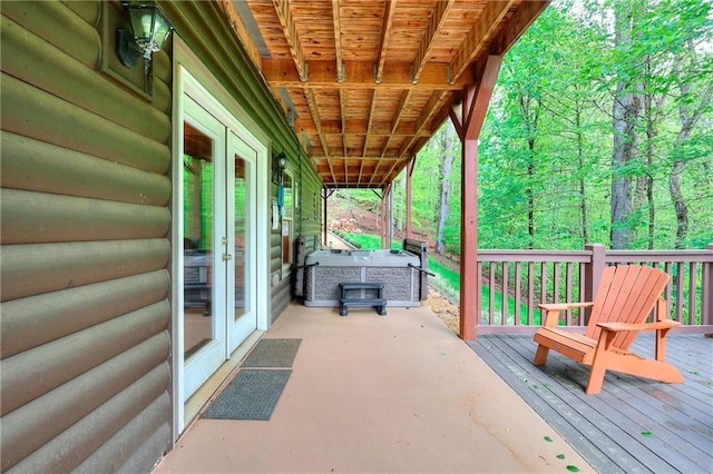 wooden deck featuring french doors