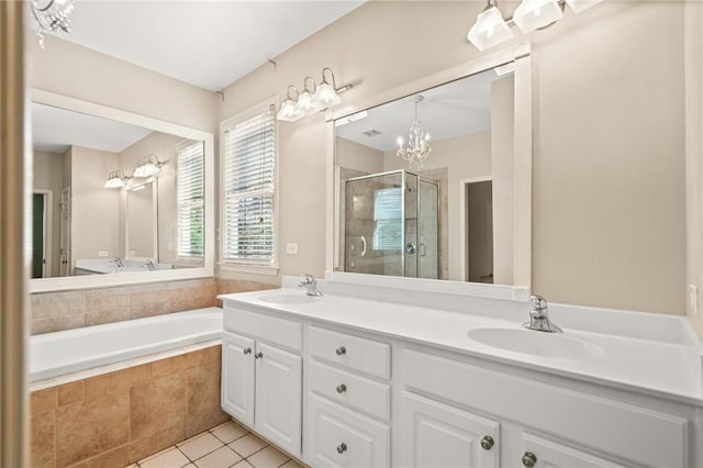 bathroom with vanity, separate shower and tub, and tile patterned floors