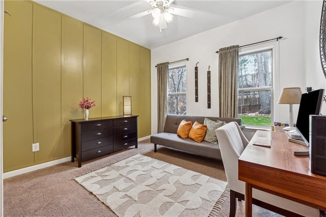 carpeted office with ceiling fan