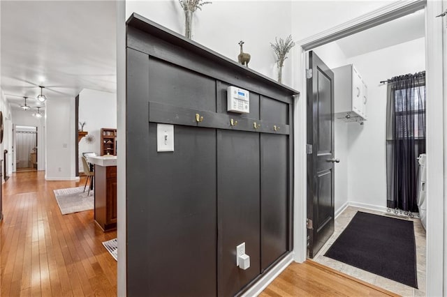 interior details featuring hardwood / wood-style flooring