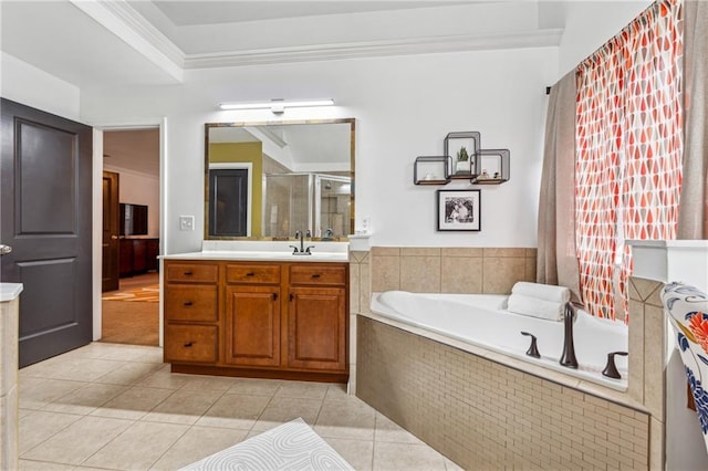 bathroom featuring vanity, ornamental molding, tile patterned floors, and plus walk in shower