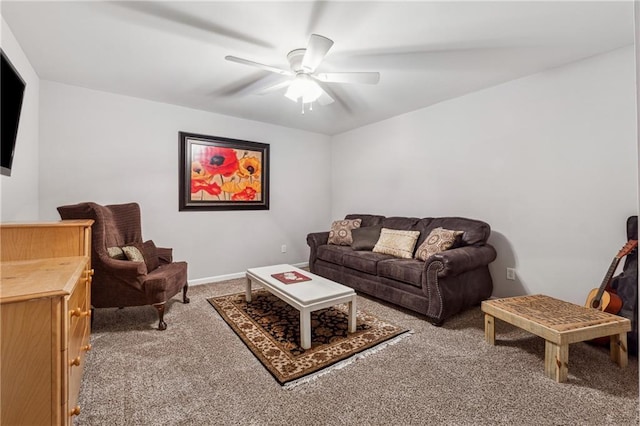 carpeted living room featuring ceiling fan