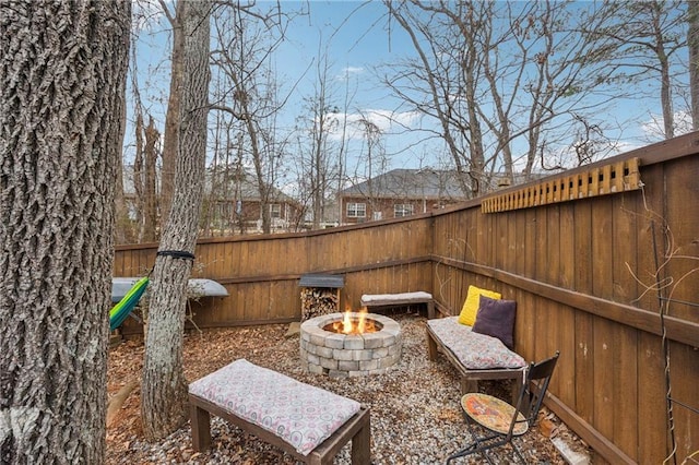 view of patio featuring a fire pit