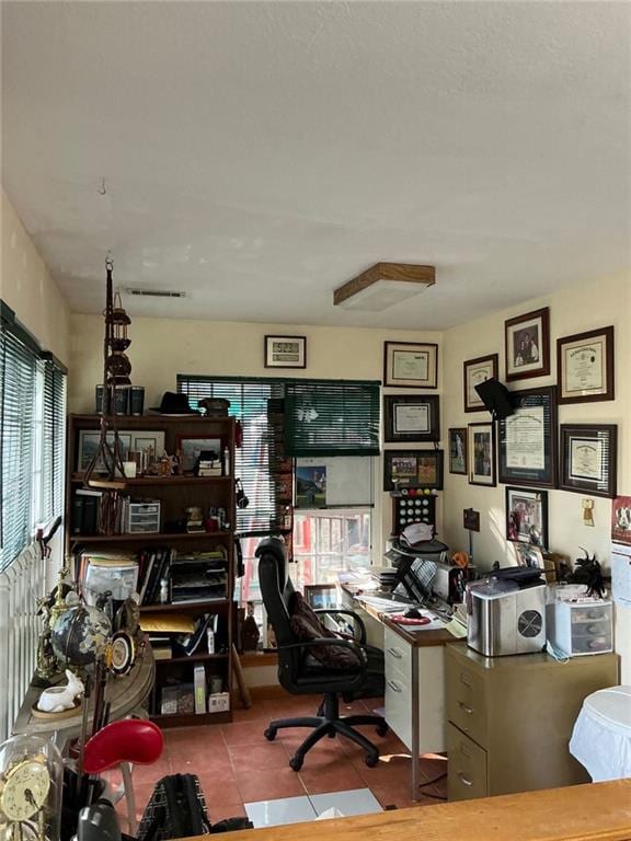 home office featuring tile patterned floors